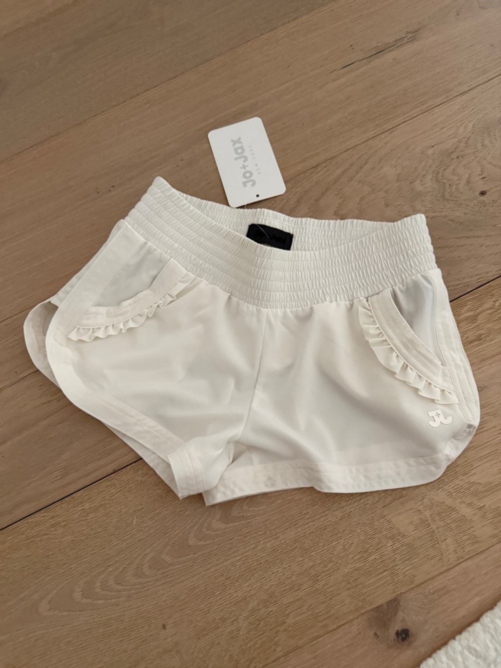 Jo and Jax Piper Girls' White Ruffle-Trim Athletic Shorts
